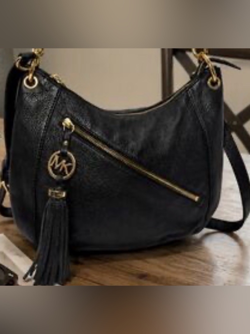 Michael Kors Black Leather Shoulder Hobo with Tassel Charm